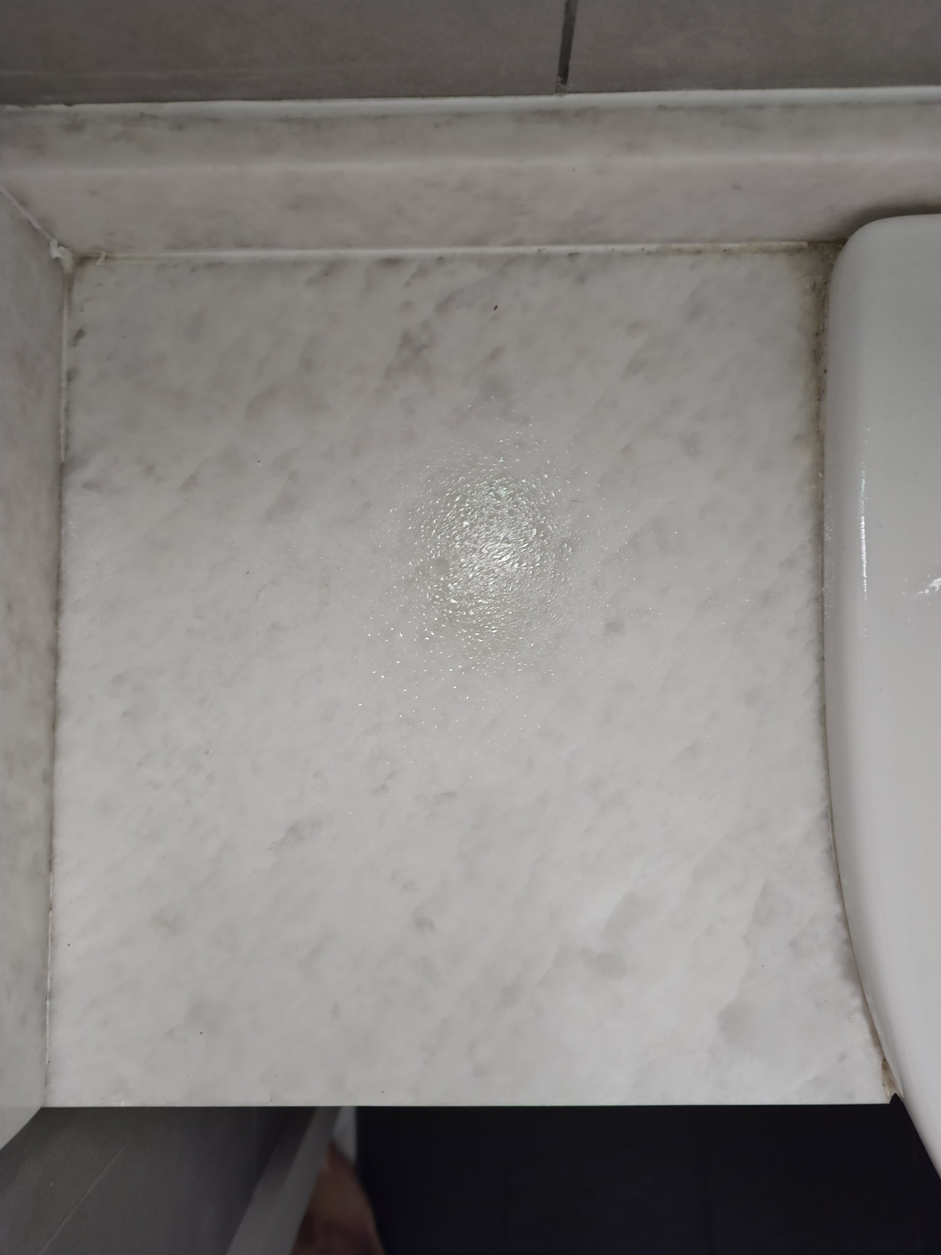 Before cleaning — accumulated dirt on bathroom countertop — Vileson Bathroom Cleaner test Dubai UAE